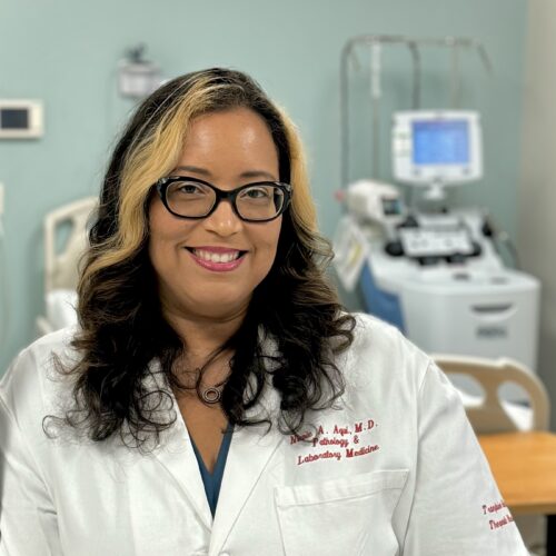 Dr. Nicole Aqui